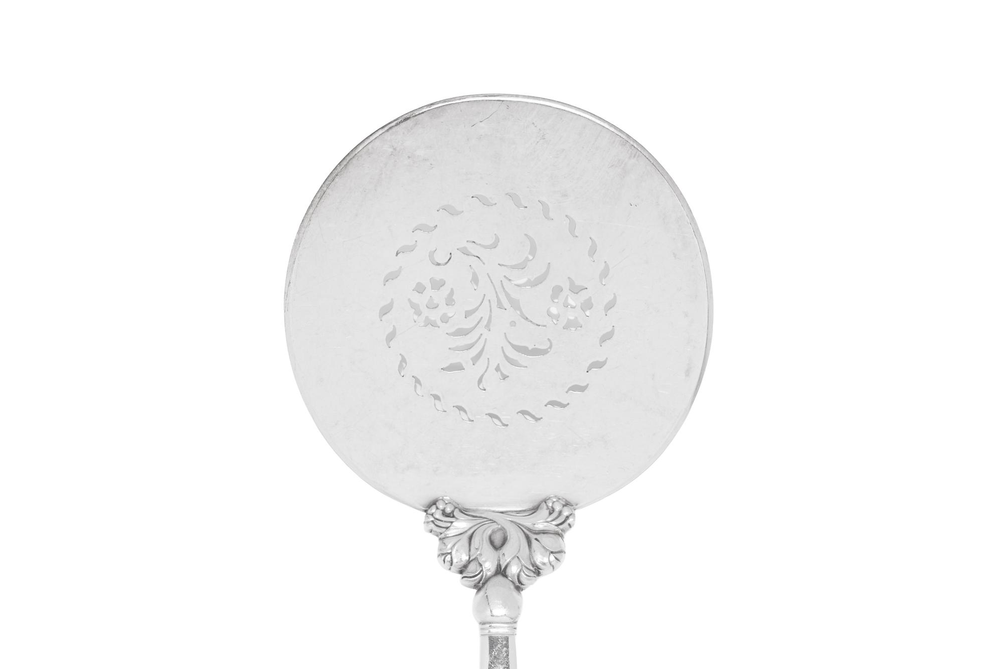A Georg Jensen Acorn Silver Tomato Server and Asparagus Tongs