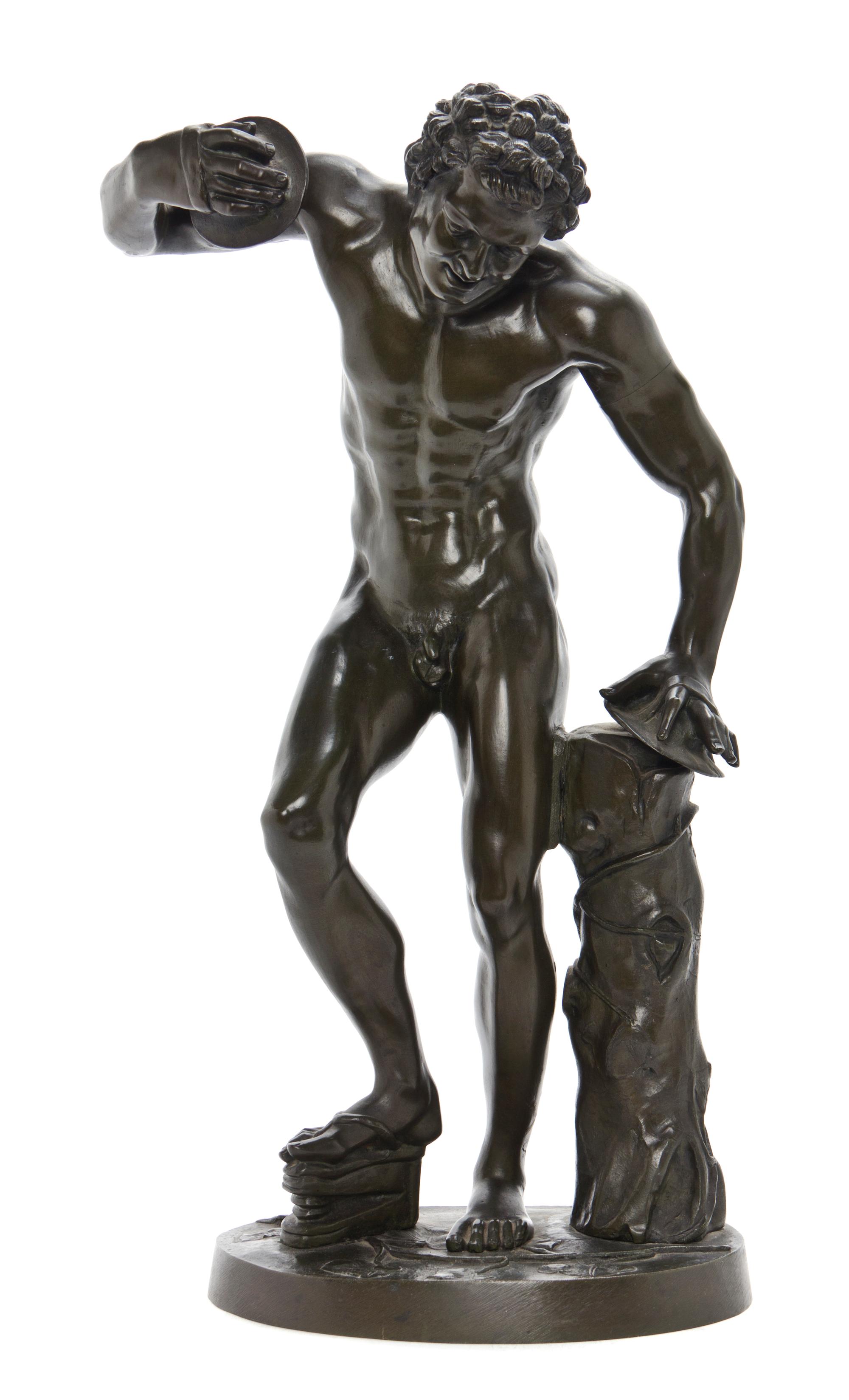 A Continental Patinated Bronze Figure, after the Antique, Height 20 1/2 inches.