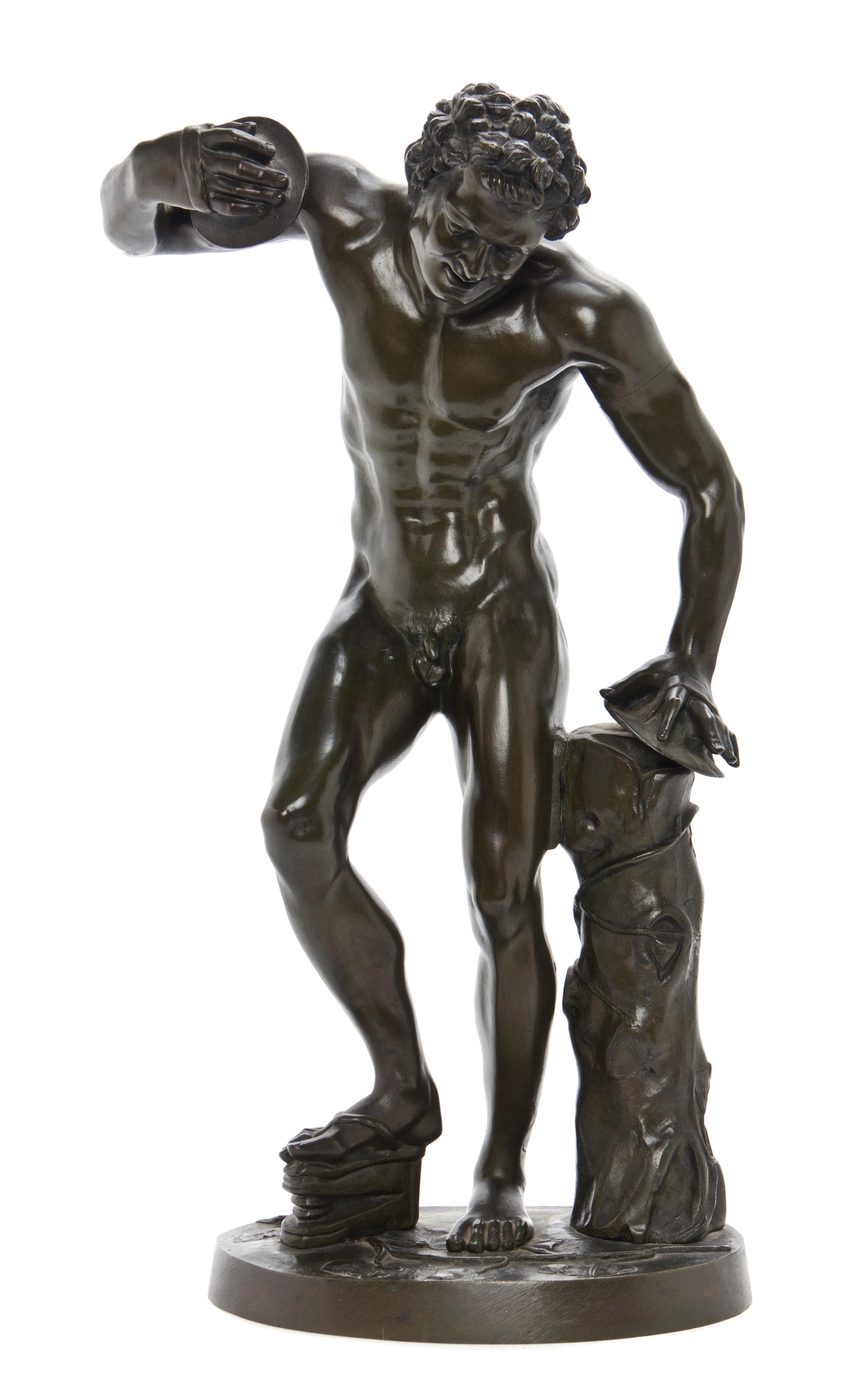 A Continental Patinated Bronze Figure, after the Antique, Height 20 1/2 inches.