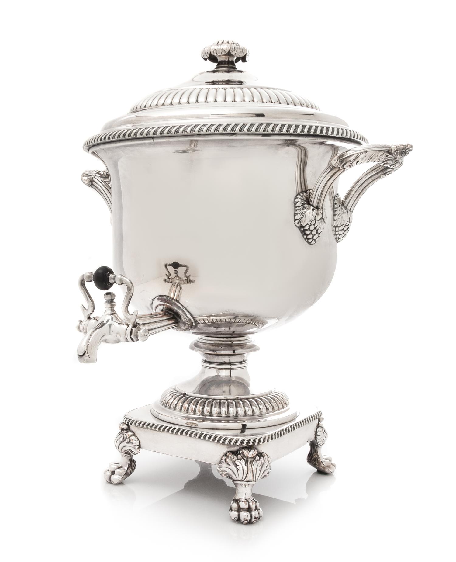 A Silver-Plate Coffee Urn, , the domed cover with a reeded band above the baluster form body having a gadroon rim and acanthus capped l