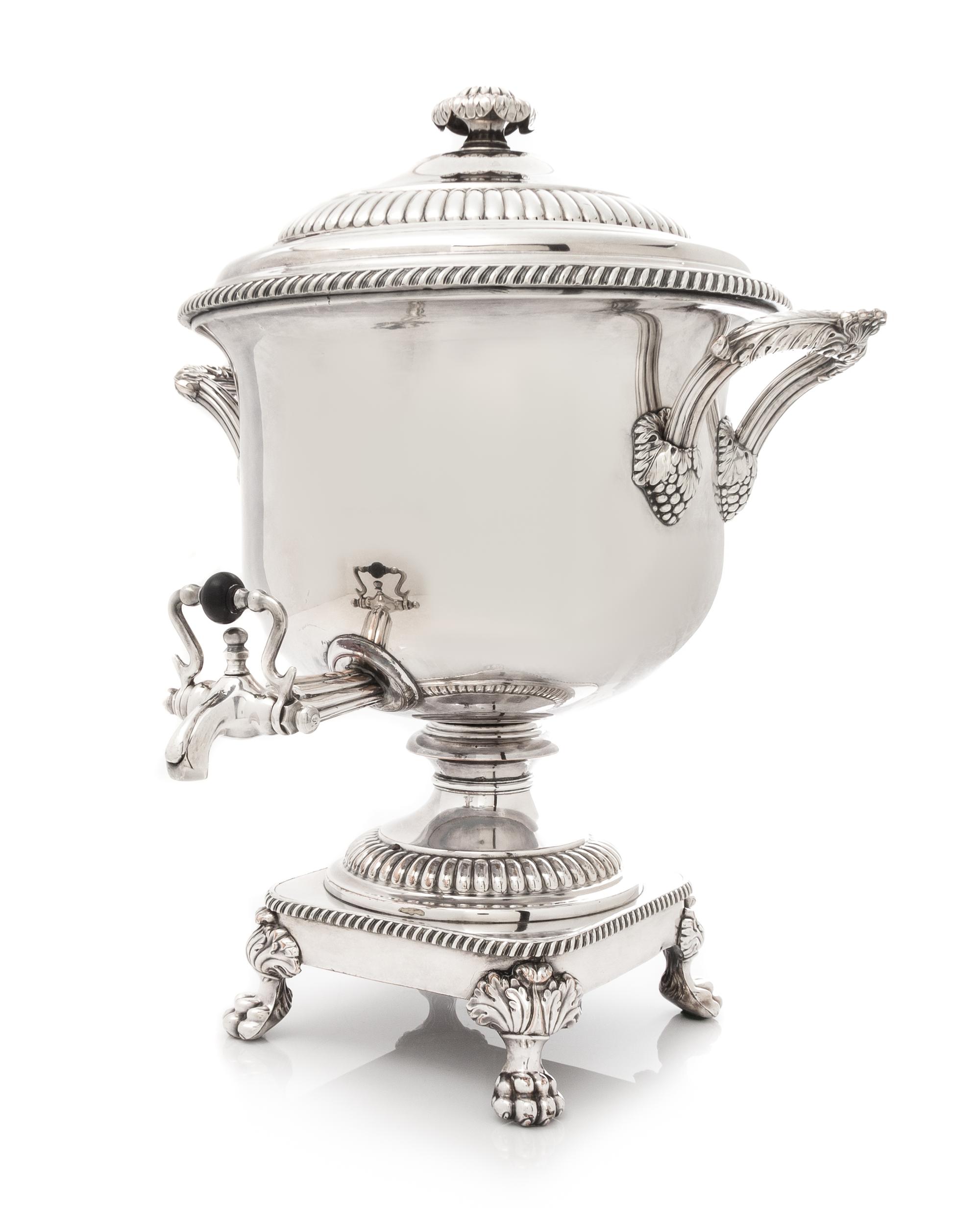 A Silver-Plate Coffee Urn, , the domed cover with a reeded band above the baluster form body having a gadroon rim and acanthus capped l