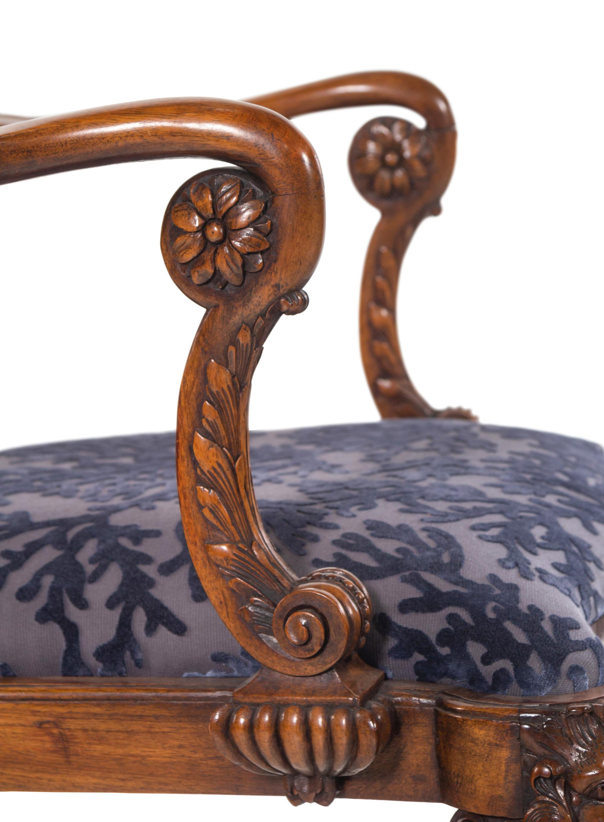 An Irish George I Style Carved Walnut Armchair