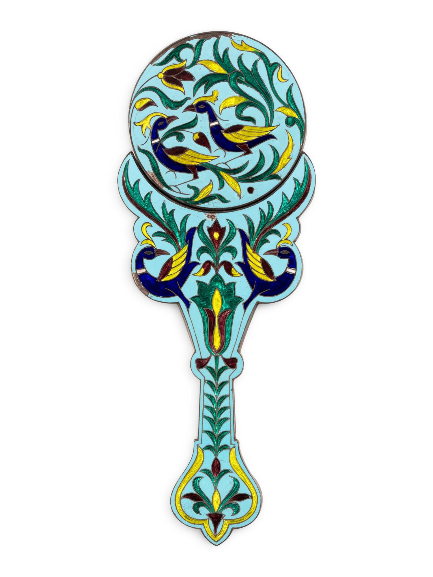 An East Indian Silver and Enamel Hand Mirror