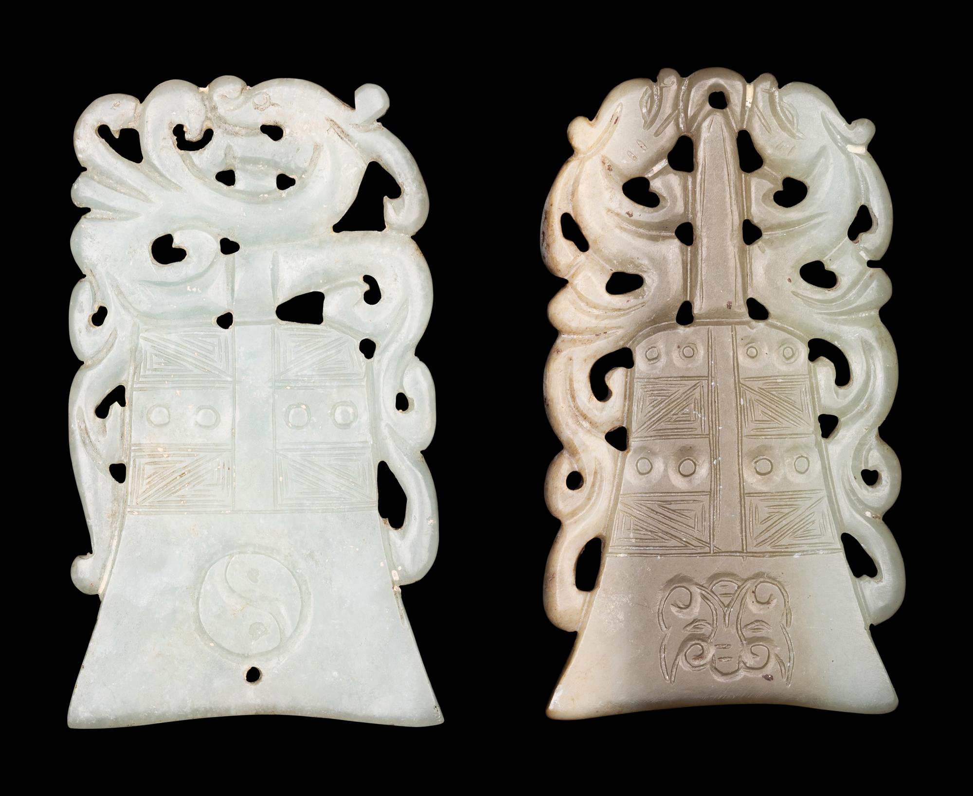 Two Celadon Jade Bell-Form Pendants