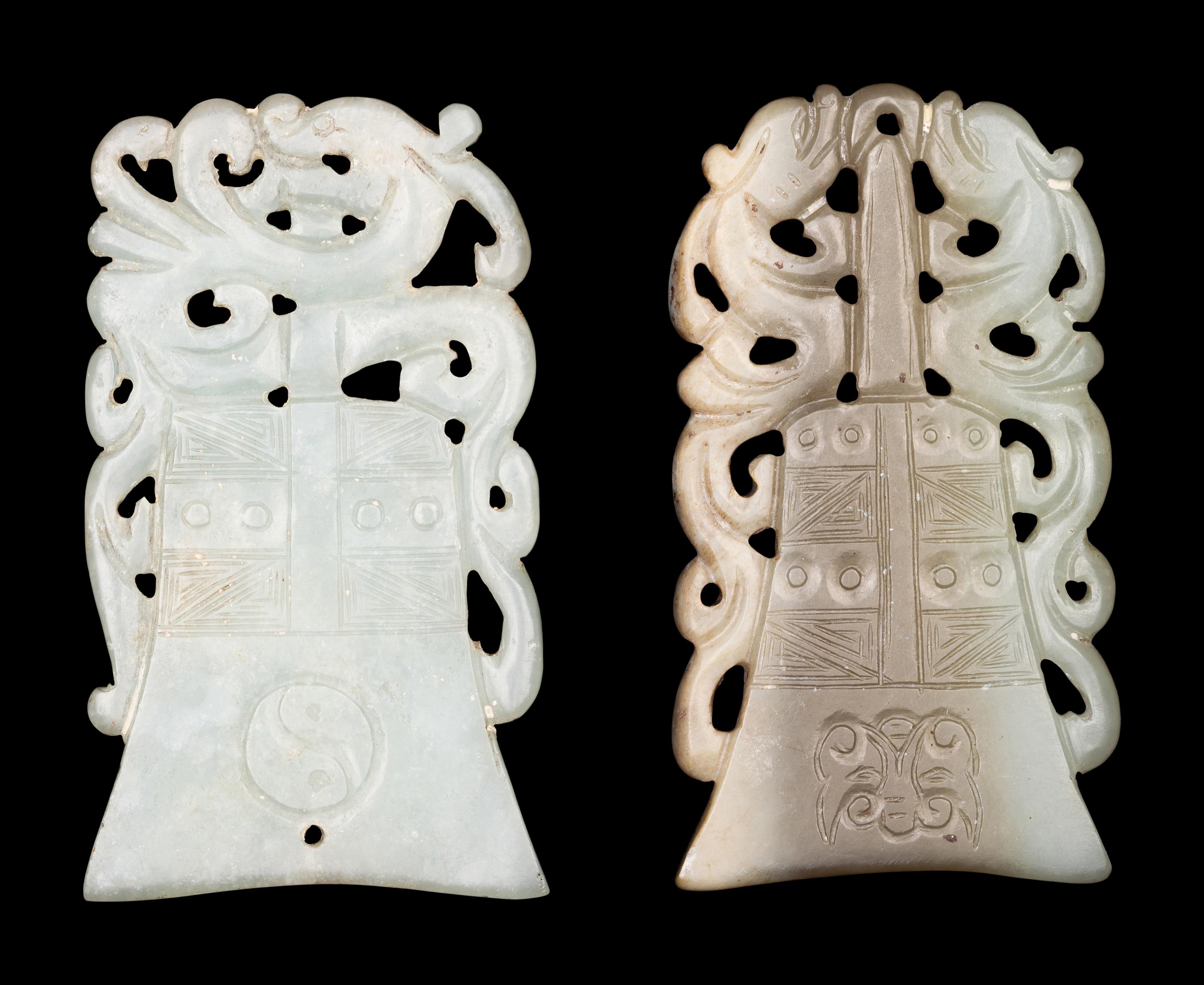 Two Celadon Jade Bell-Form Pendants