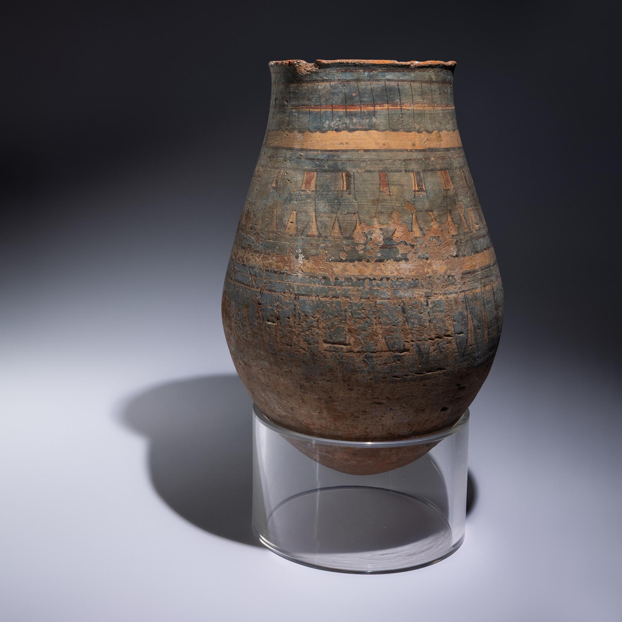 An Egyptian Blue-Painted Terracotta Jar