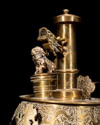 A Tibetan Silver and Copper Covered Ewer and A Chinese Bronze Pitcher