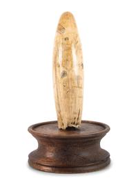 A Scrimshaw Whale's Tooth