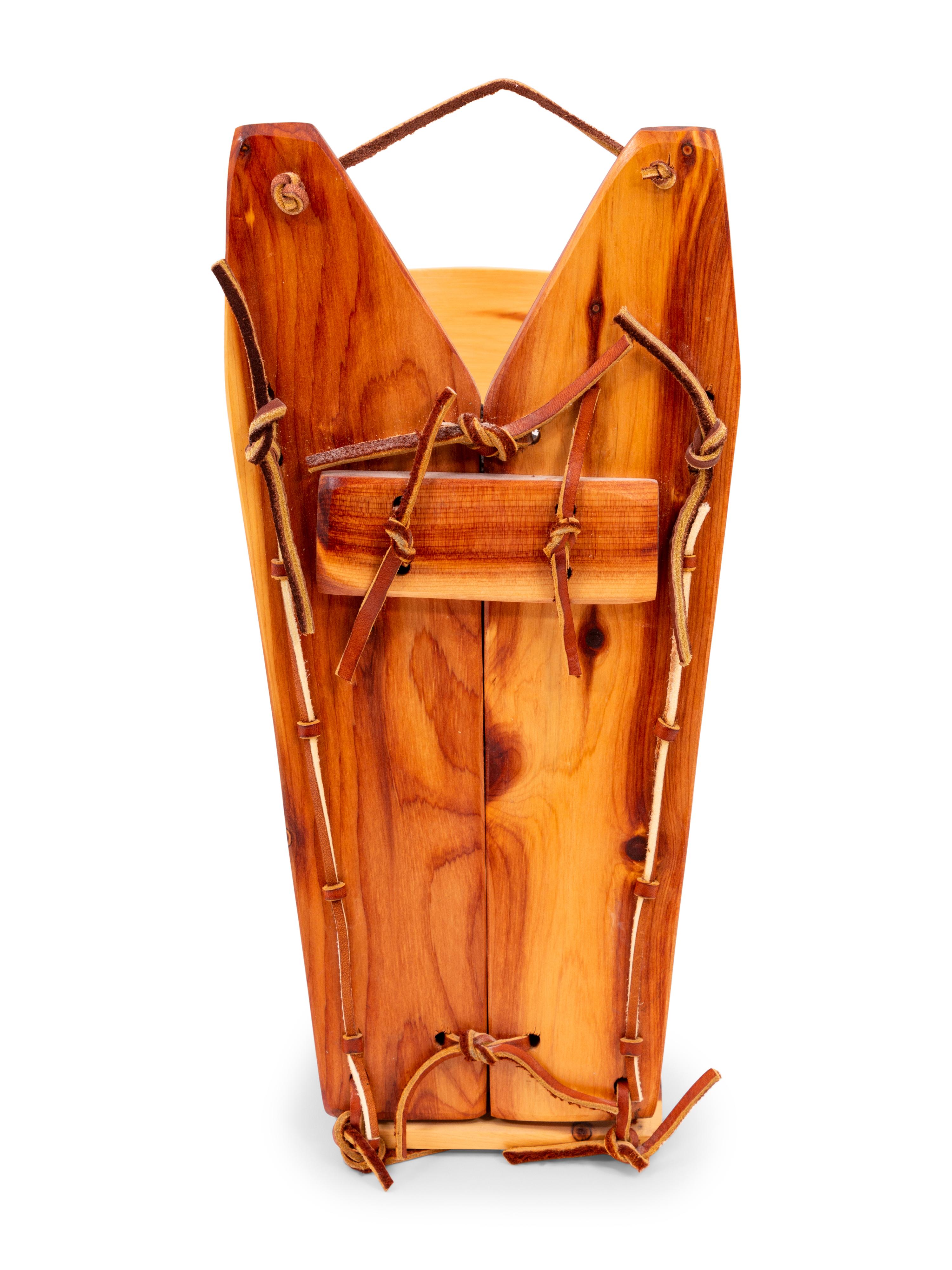 Pottery Doll in Cradle