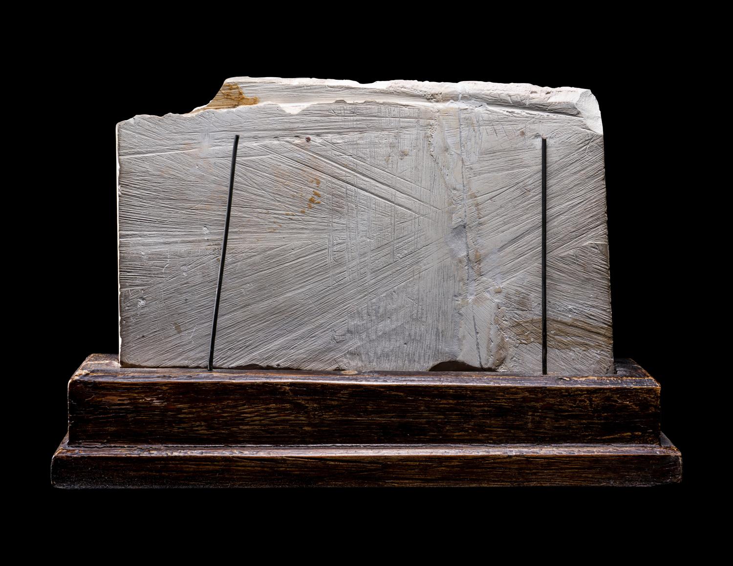 An Egyptian Limestone Relief Fragment