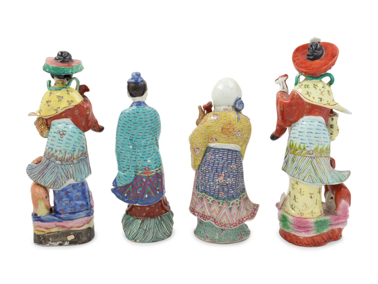 Four Chinese Famille Rose Figures of Immortals