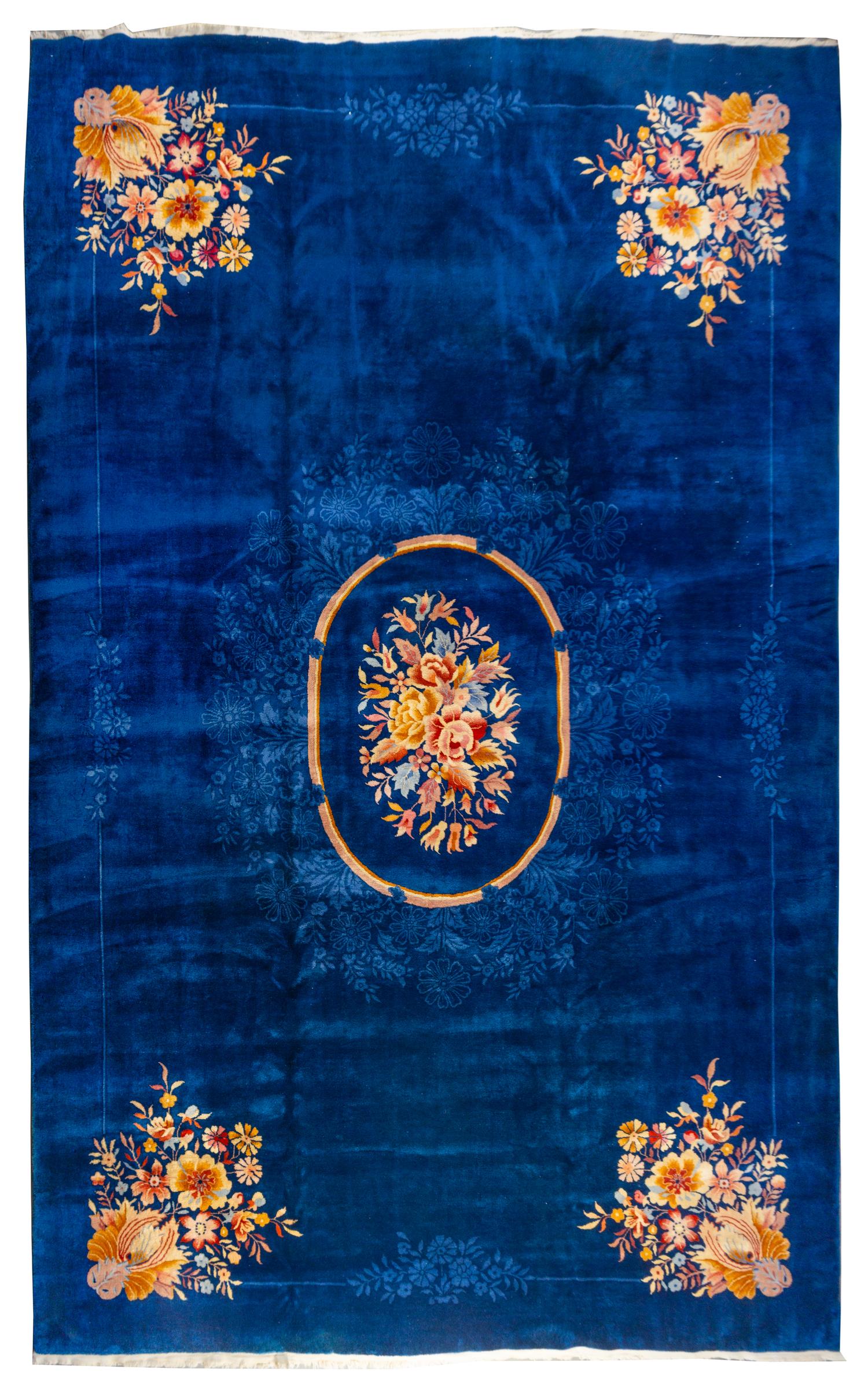 A Chinese Wool Rug 16 feet x 10 feet 8 inches. — CIRCA 1920s