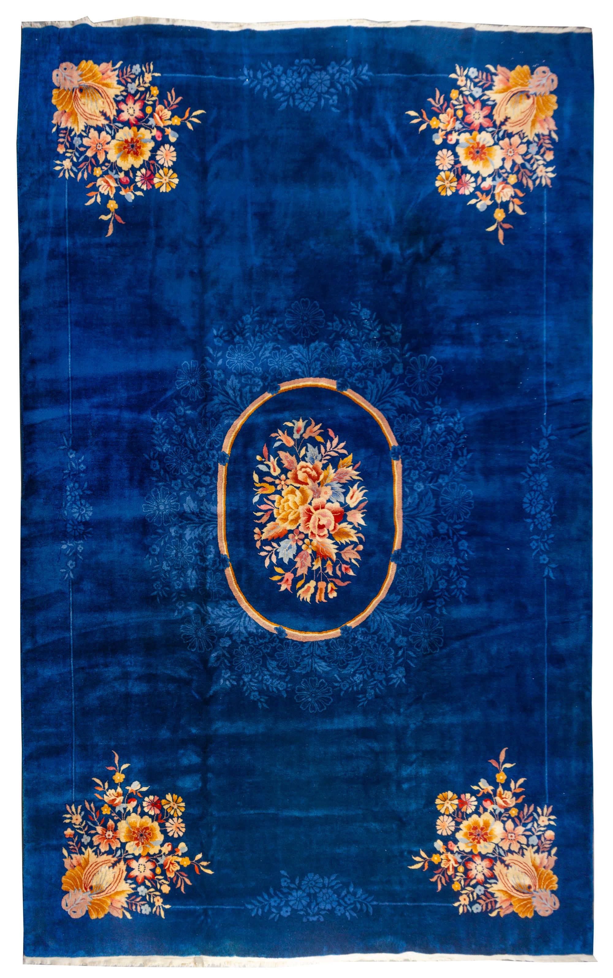 A Chinese Wool Rug 16 feet x 10 feet 8 inches. — CIRCA 1920s