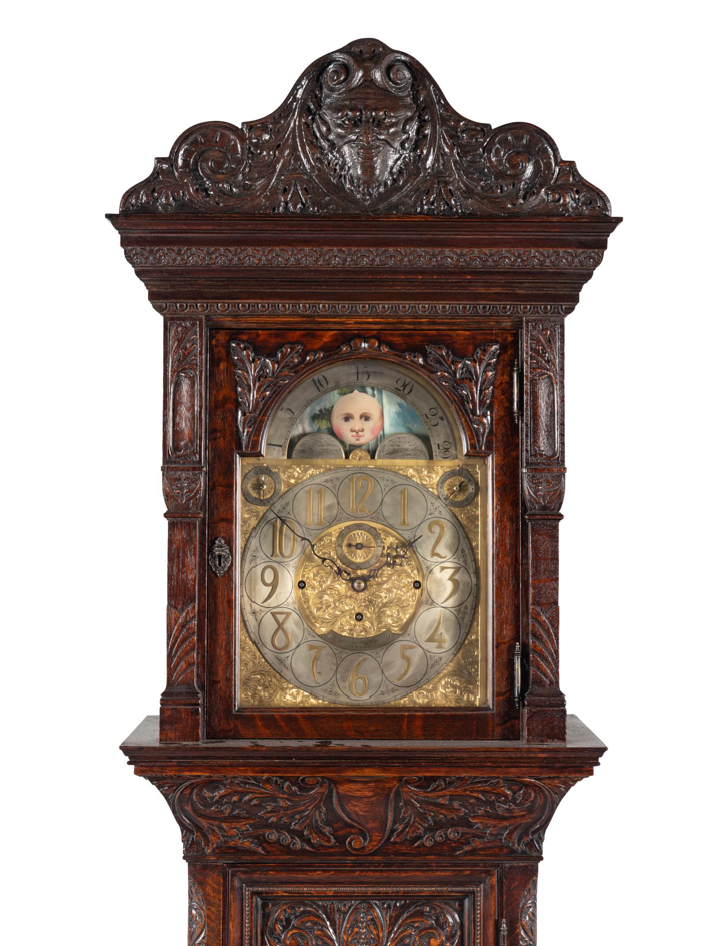 A Renaissance Revival Carved Oak Eight-Tube Tall Case Clock