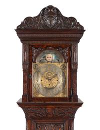 A Renaissance Revival Carved Oak Eight-Tube Tall Case Clock