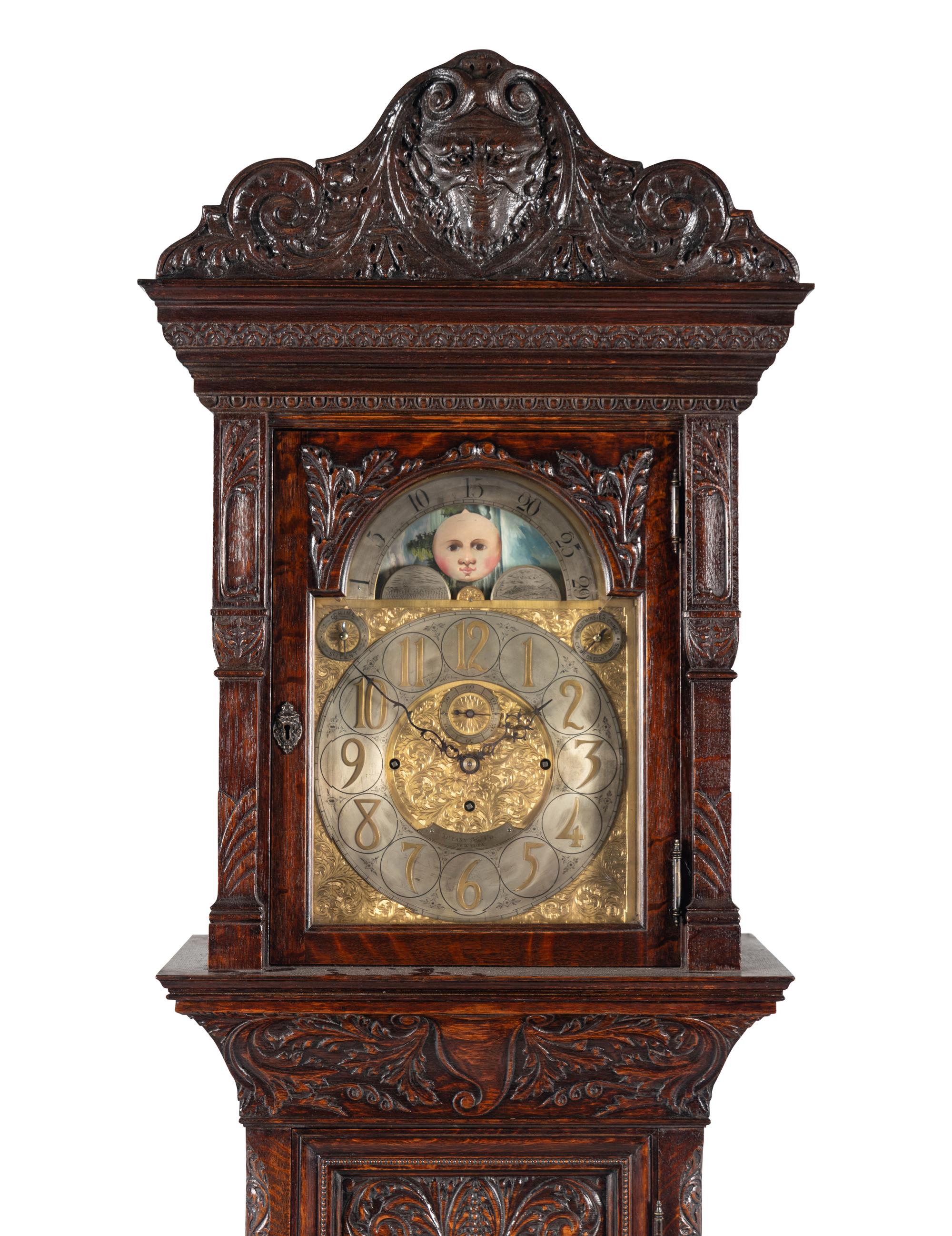 A Renaissance Revival Carved Oak Eight-Tube Tall Case Clock