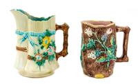 Two Majolica Water Pitchers Height of taller 9 1/2 inches. — LATE 19TH/EARLY 20TH CENTURY
