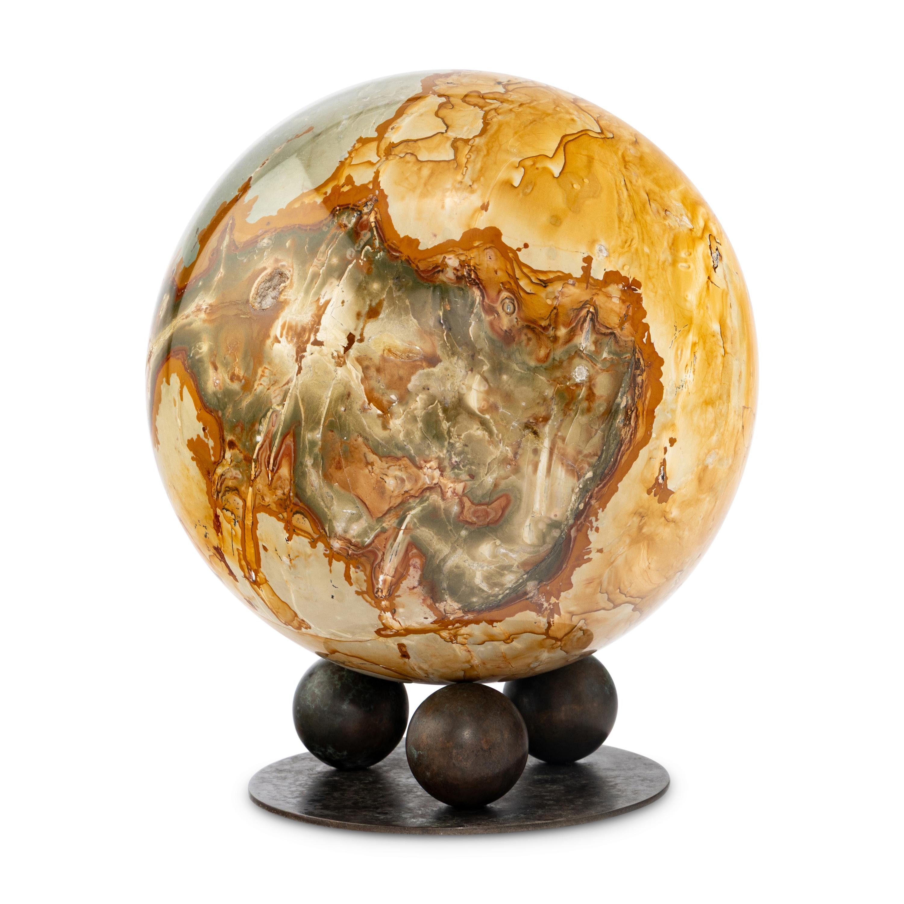 A Petrified Wood Spherical Ornament