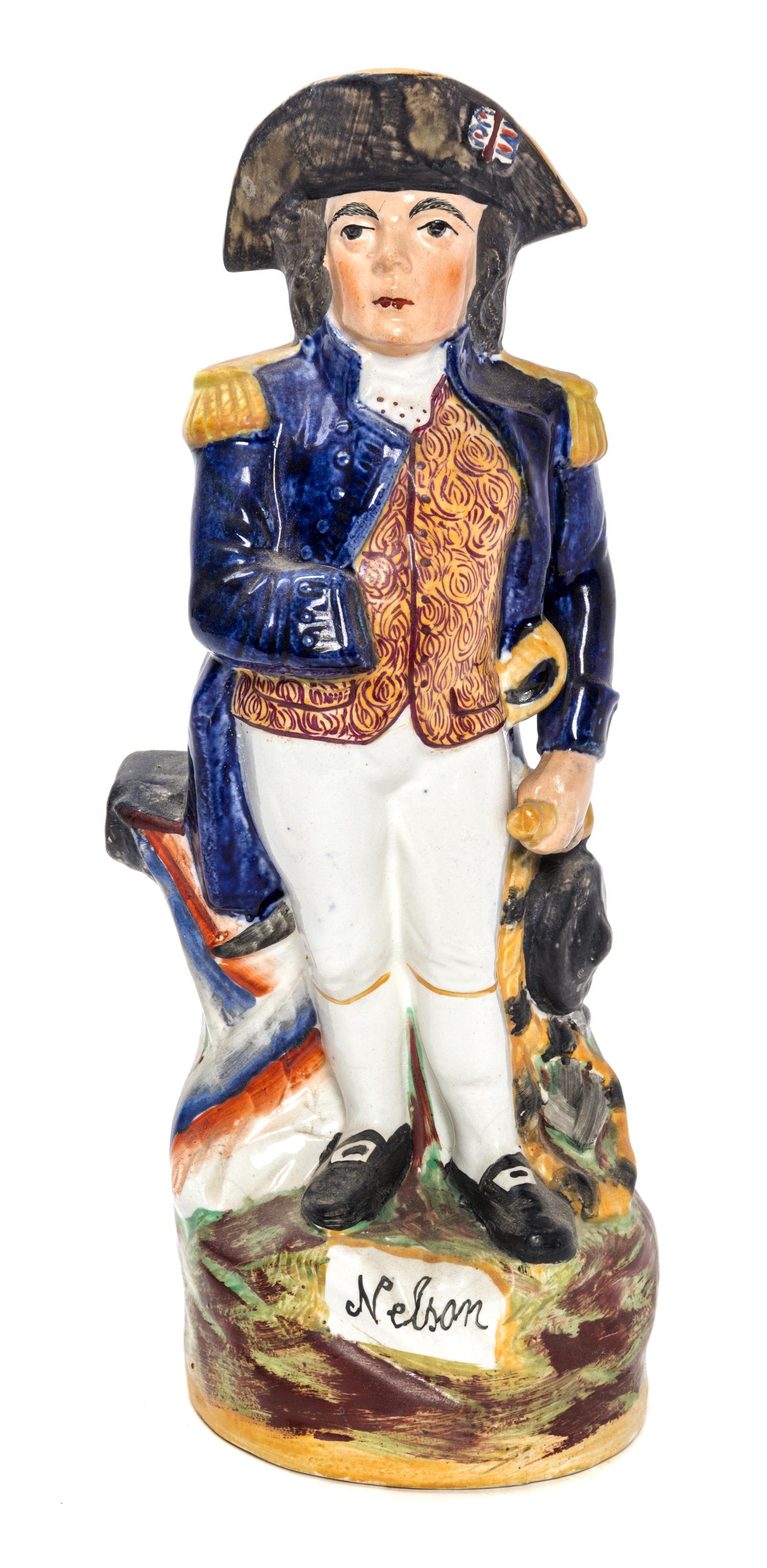 A Staffordshire Figural Pitcher Height 11 1/2 inches. — 19TH CENTURY