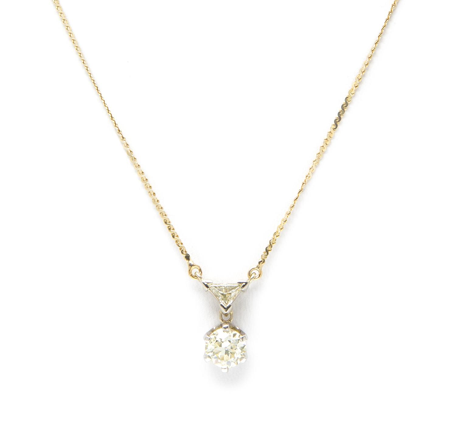 A 14 Karat Yellow and Diamond Pendant, 2.40 dwts.