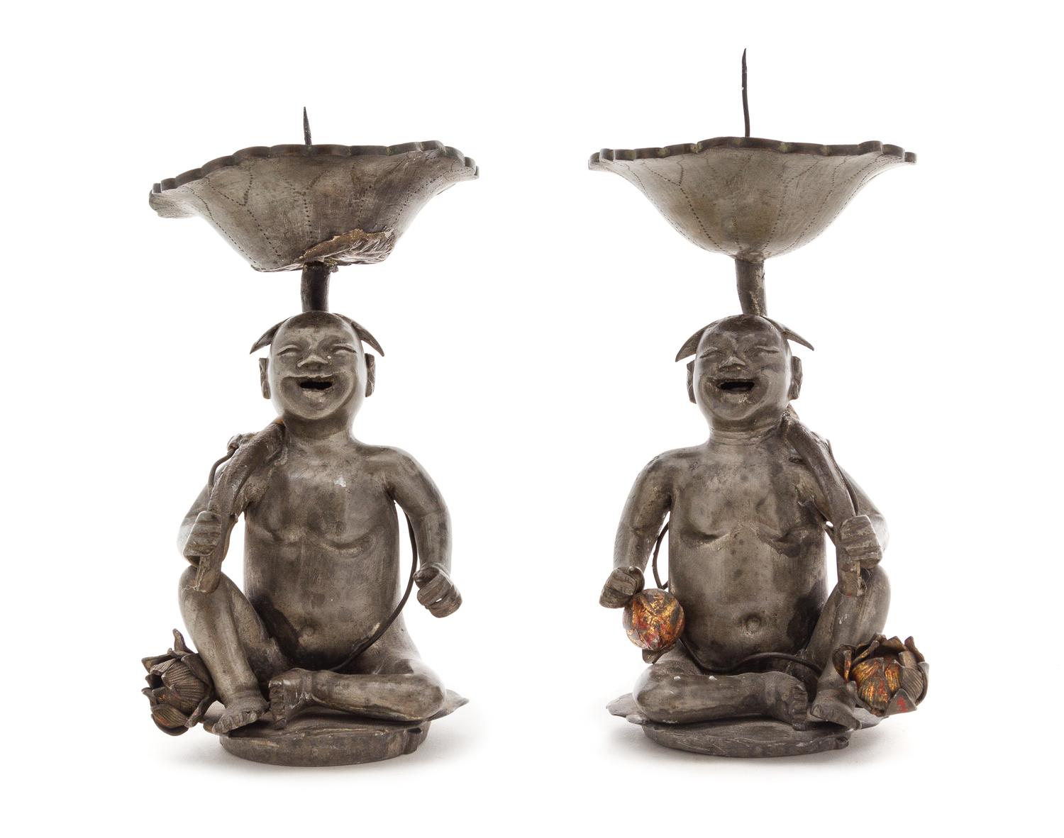 A Pair of Chinese Pewter Figural Form Candle Holders Height of each 8 1/4 inches. — 19TH CENTURY