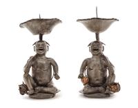 A Pair of Chinese Pewter Figural Form Candle Holders Height of each 8 1/4 inches. — 19TH CENTURY