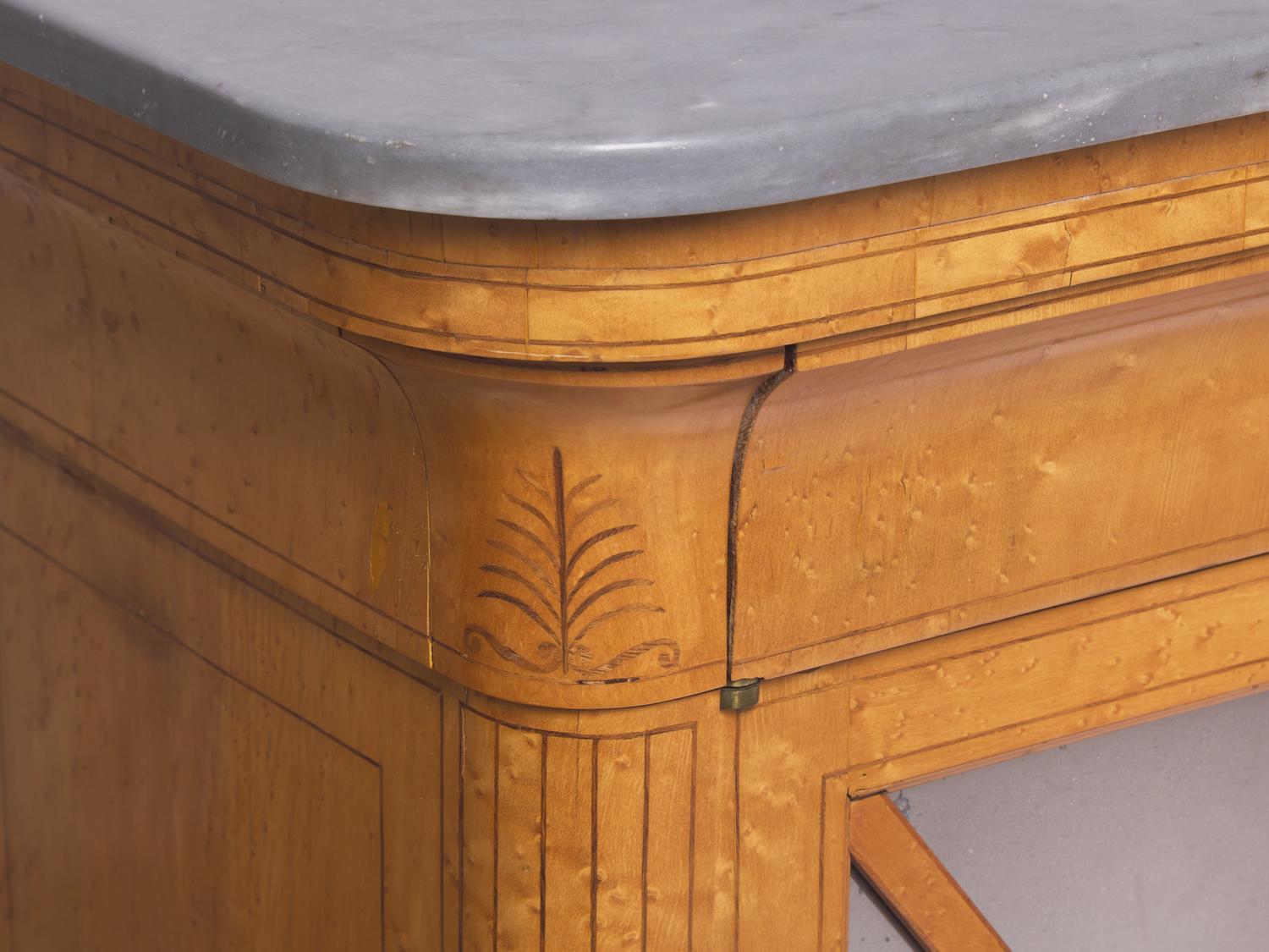 A Charles X Amaranth-Inlaid Bird's Eye Maple Side Cabinet