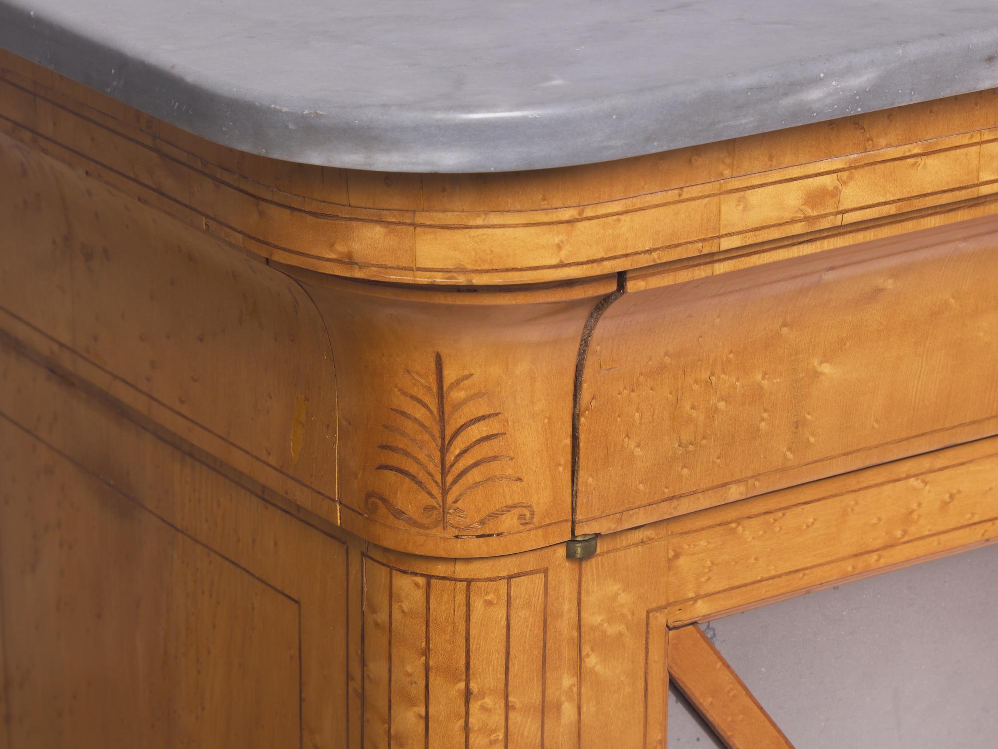 A Charles X Amaranth-Inlaid Bird's Eye Maple Side Cabinet