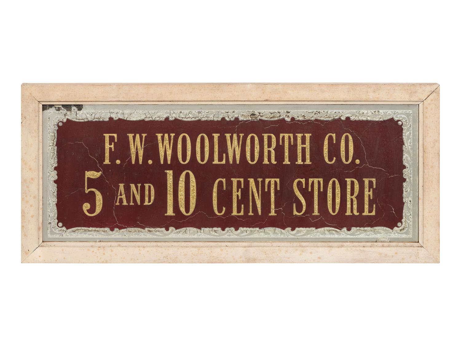 An F.W. Woolworth Reverse Paint and Foil Decorated Advertising Sign