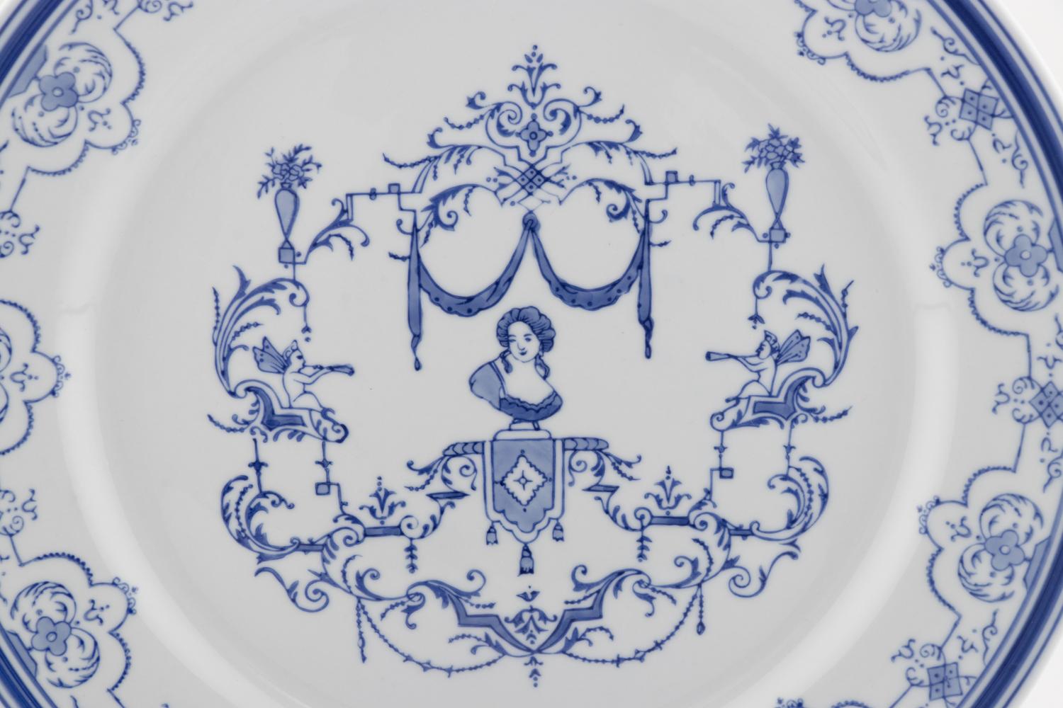 A Set of Twenty Porcelain Chargers