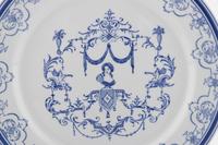 A Set of Twenty Porcelain Chargers