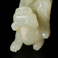 A rare Chinese jade carving of a foreigner and mythical beast 胡人戏兽玉雕 Tang dynasty or later ????