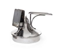 An Austrian Silver-Plate Cigar Lighter, 20th Century, of circular handled form with a matchbox holder.