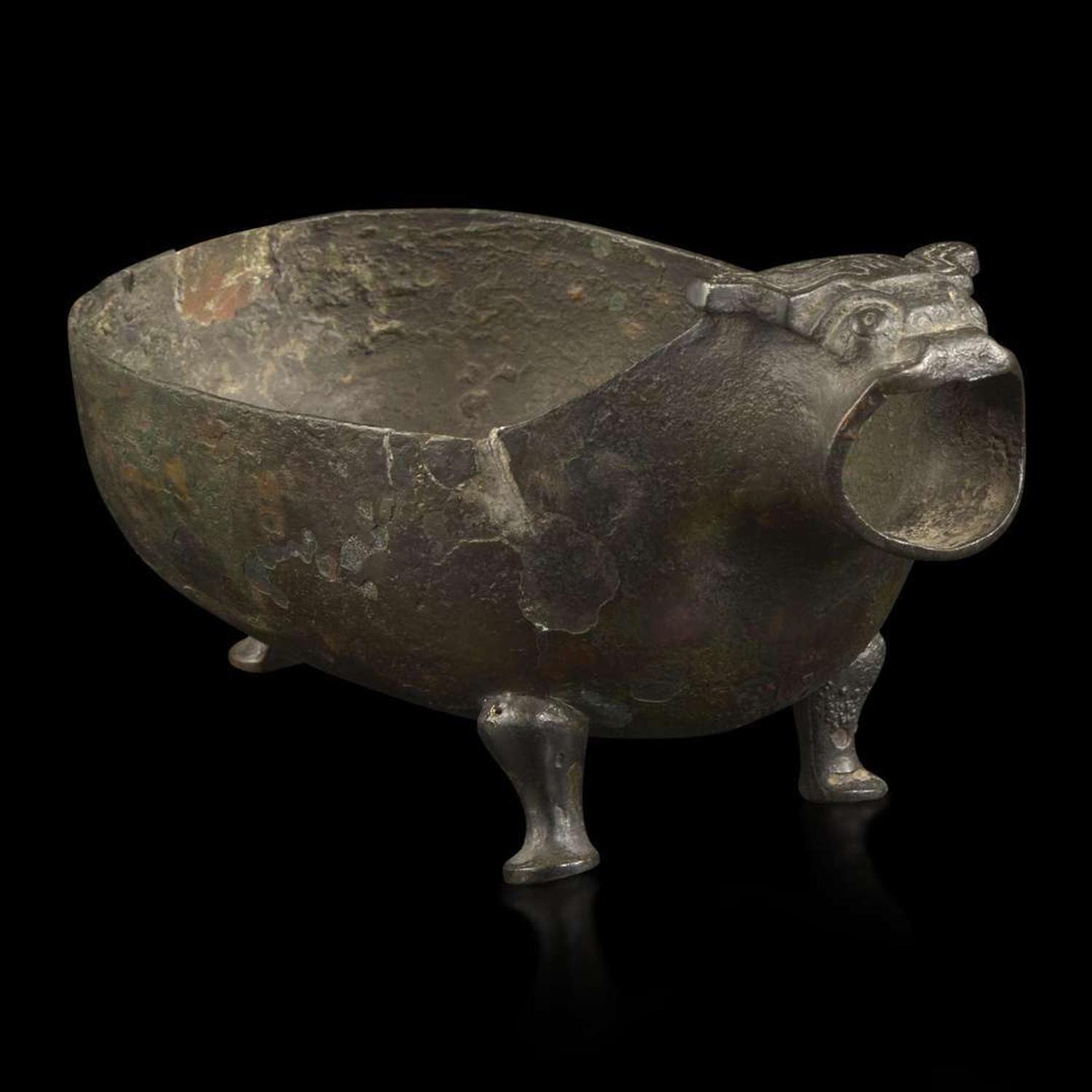 A Chinese archaic bronze animal-form pouring vessel, Yi 青铜兽形匜 Late Eastern Zhou period ????