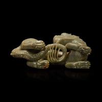 A Chinese carved celadon-grey jade dragon and wood stand 青灰玉龍及木底座