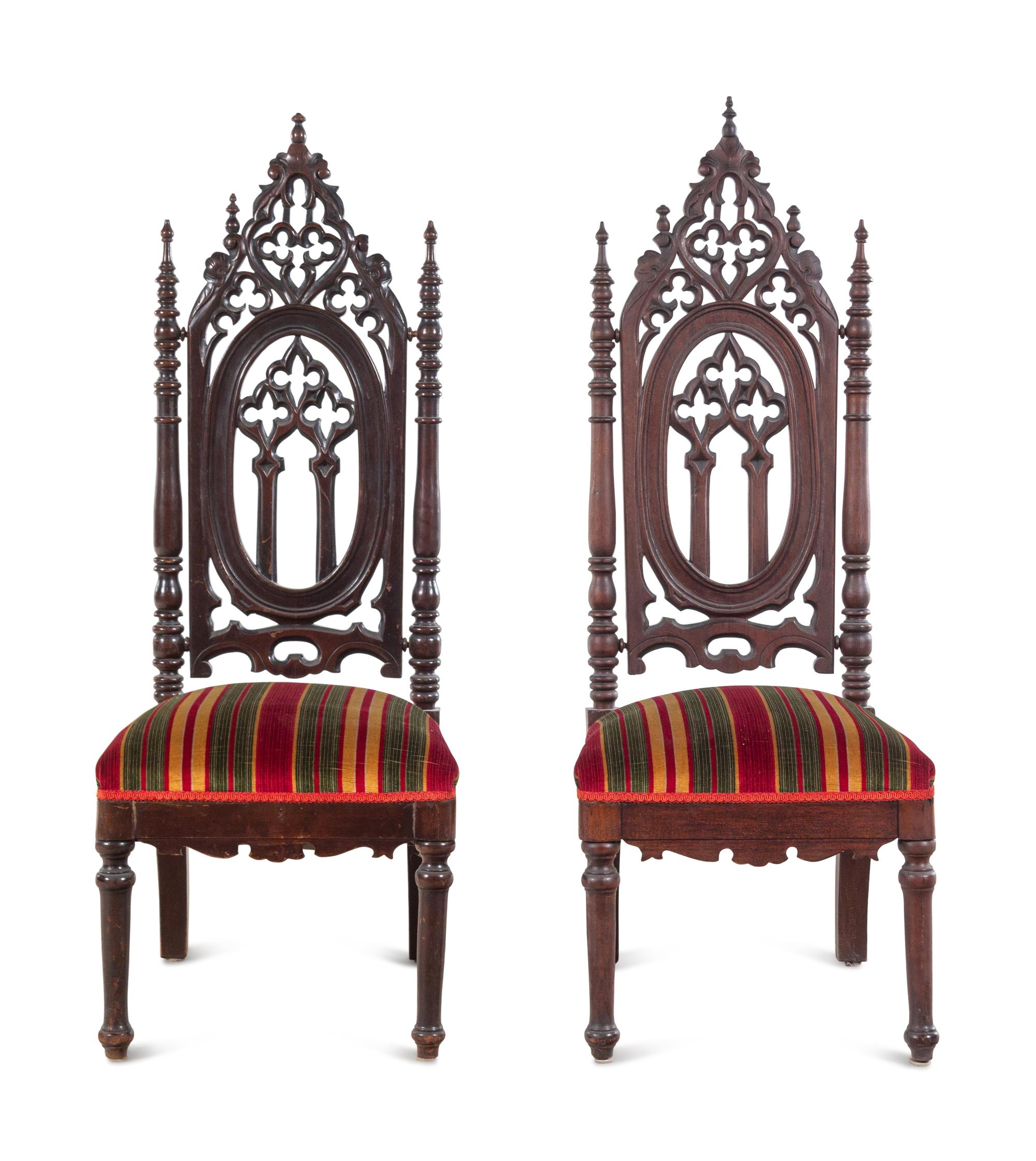 A Pair of Victorian Gothic Carved Walnut Side Chairs