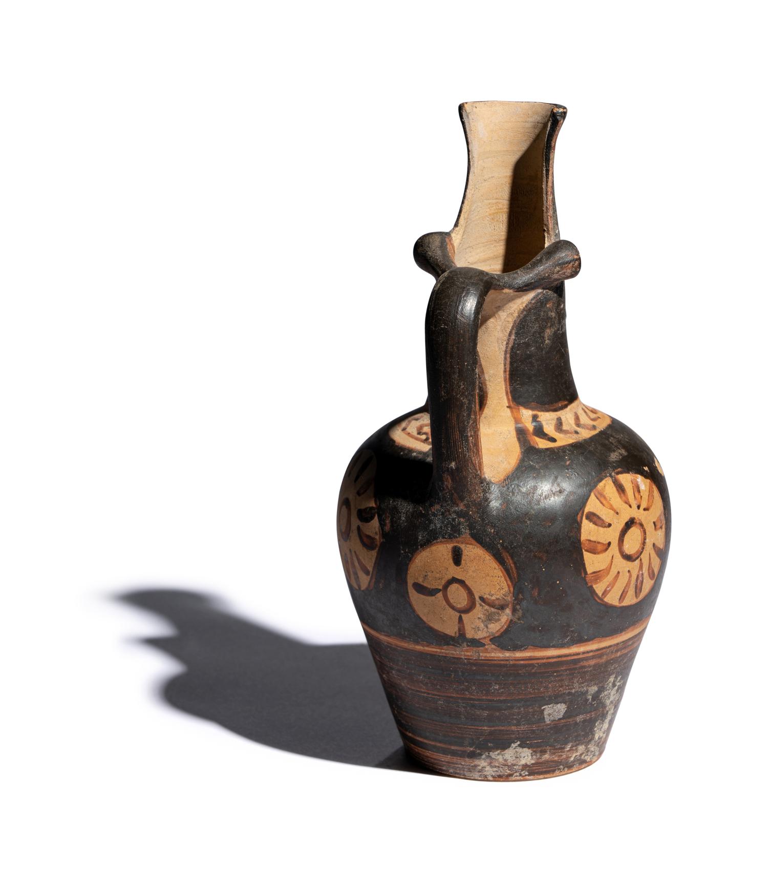 An Etruscan Red-Figured Beak-Spouted Oinochoe