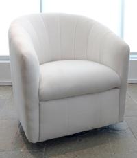 A Contemporary White-Upholstered Swivel Tub Chair Height 32 inches. — 20TH CENTURY