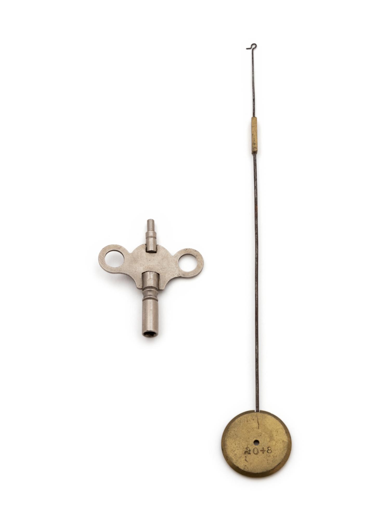 A French Bronze and Sienna Marble Figural Mantel Clock