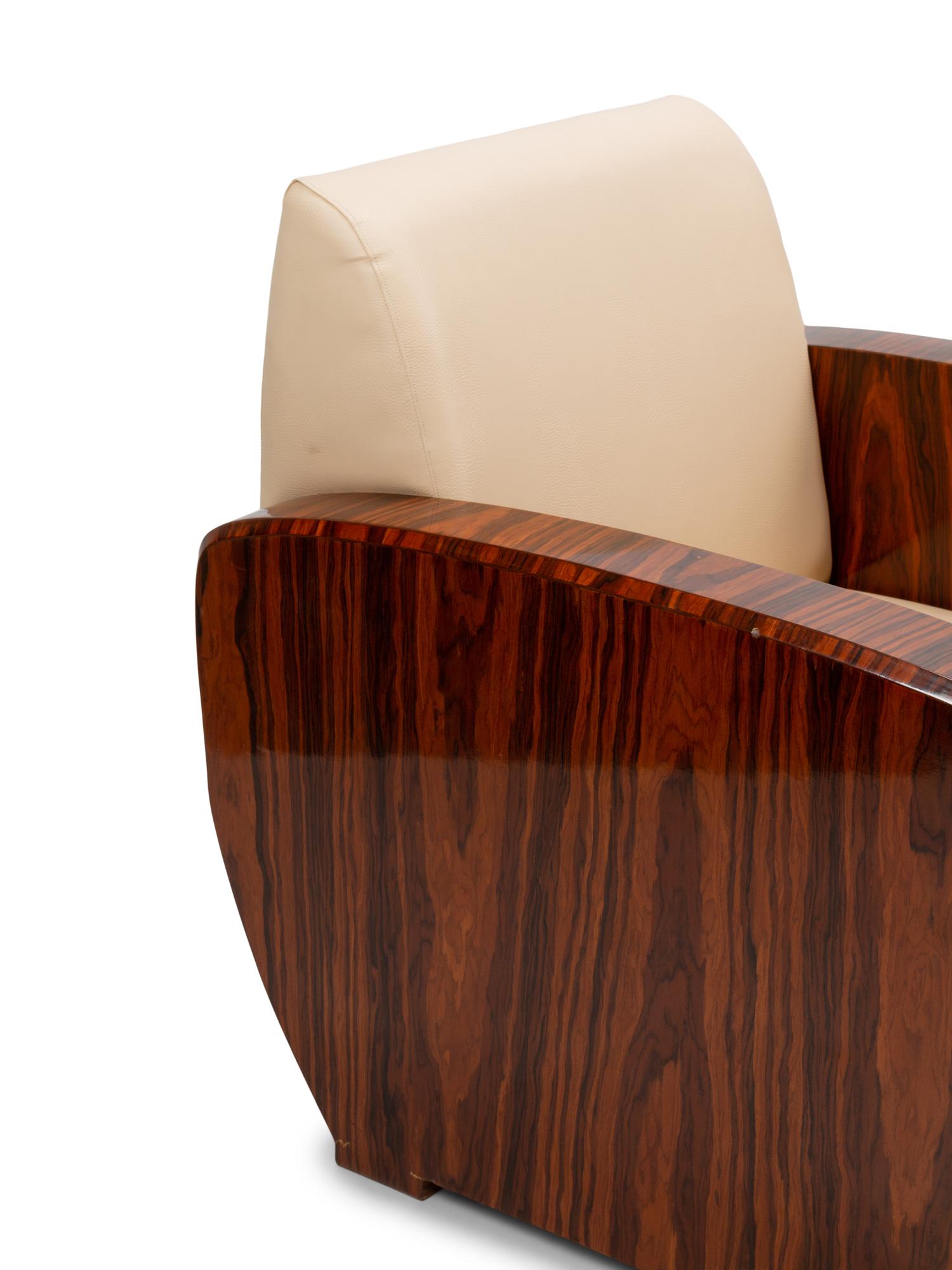 A Pair of Art Deco Style Rosewood Lounge Chairs