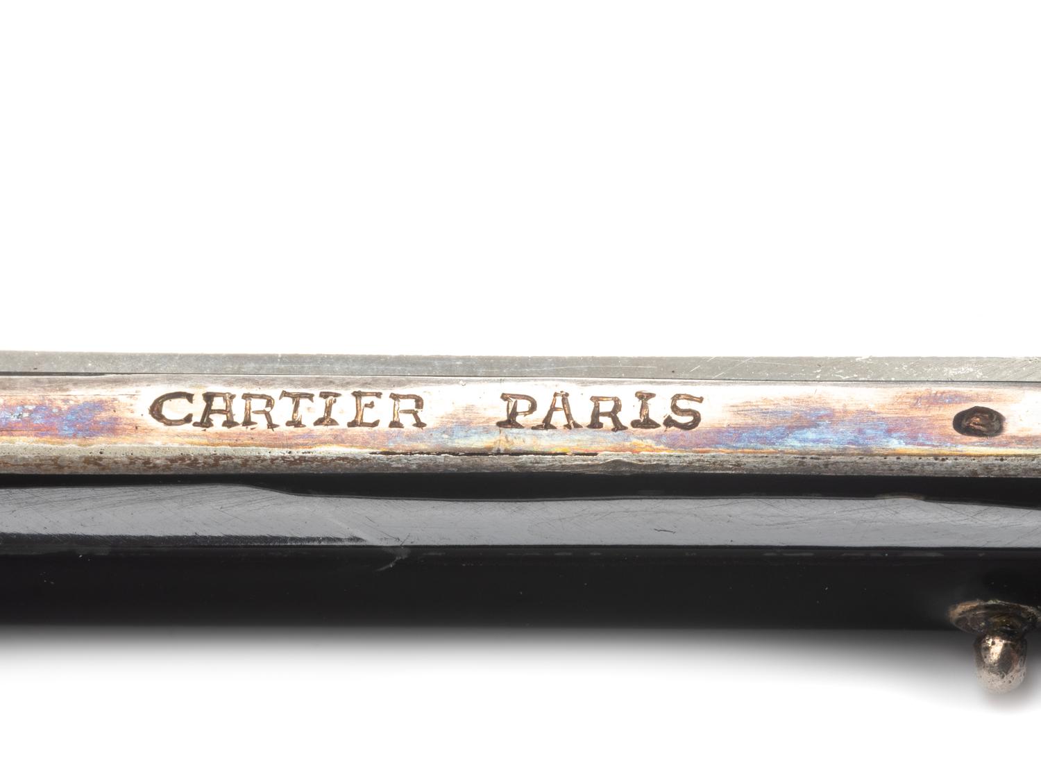 A Cartier Art Deco Diamond and Platinum-Mounted Enamel Compact
