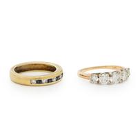 TWO DIAMOND AND YELLOW GOLD RINGS