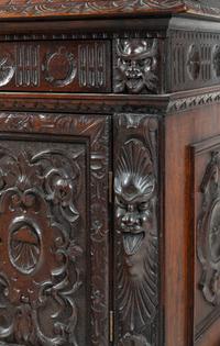 An Austrian Carved Walnut Cabinet