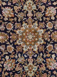 A Qum Silk Rug
