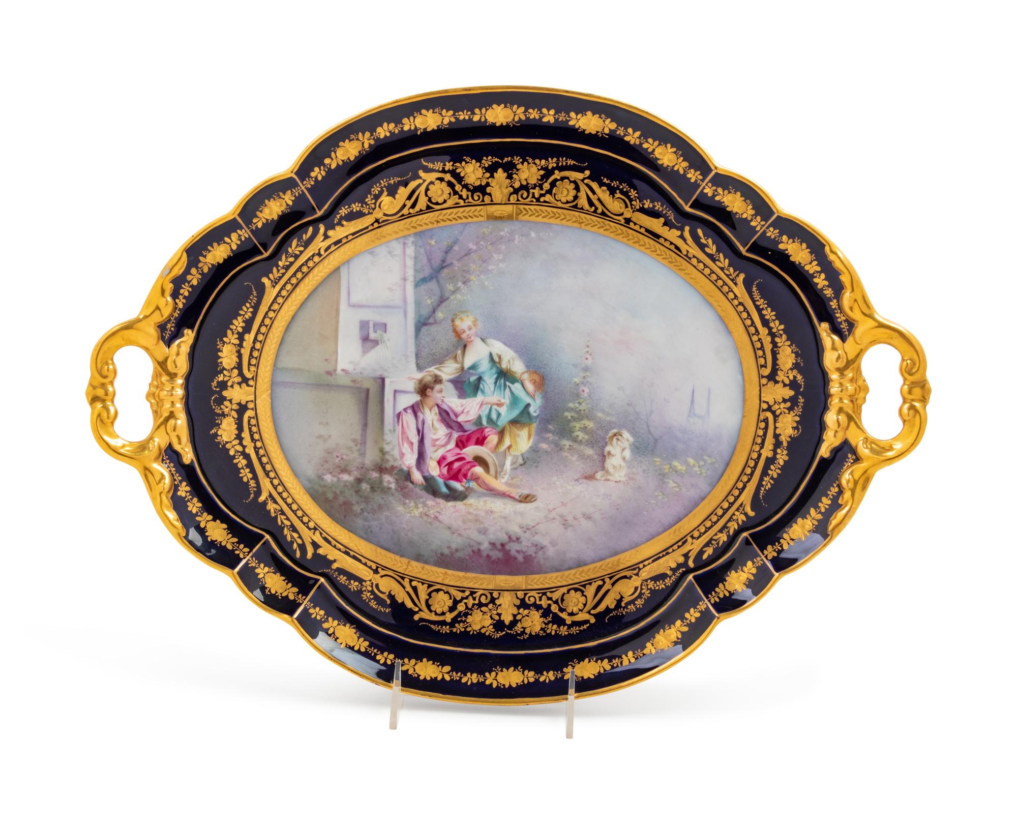 A Sèvres Style Painted and Parcel Gilt Porcelain Two-Handled Tray