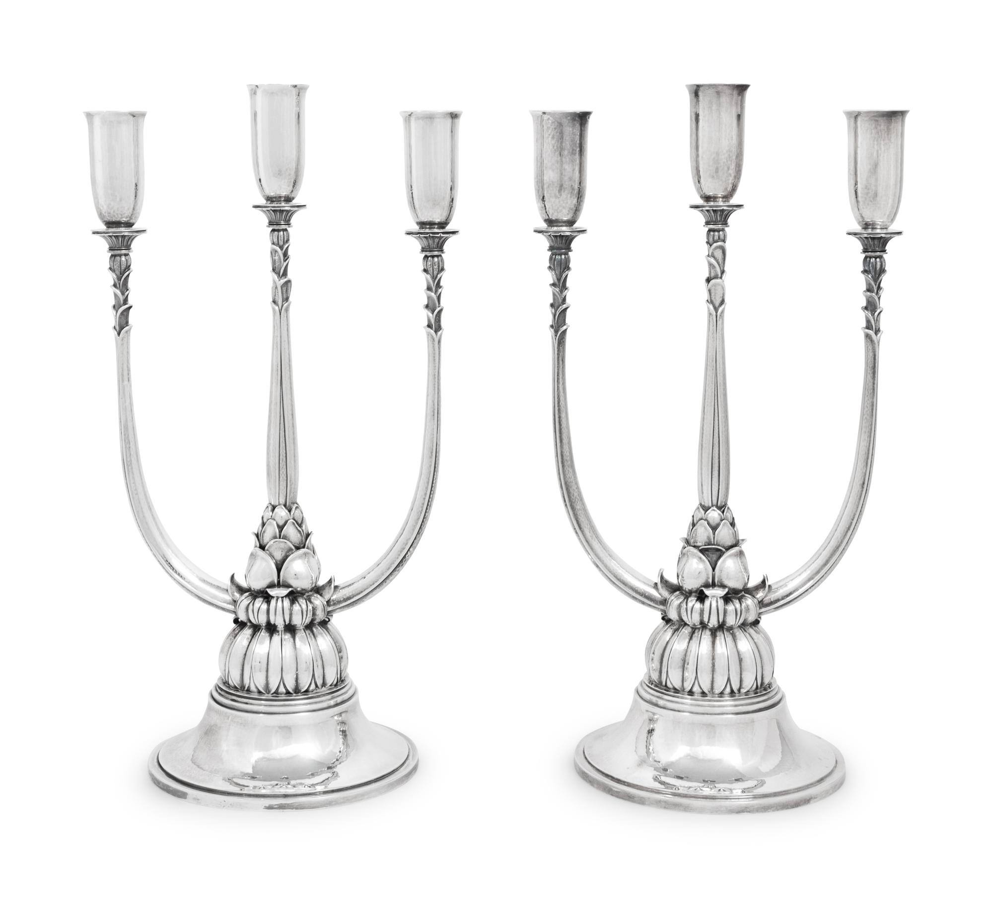 A Pair of Harald Nielsen for Georg Jensen Silver Three-Light Candelabra