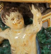 A Pair of Tin-Glazed Earthenware Wall Brackets, and Two Giltwood Wall Brackets