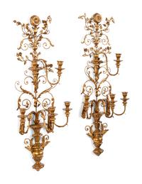 A Pair of Rococo Style Five Light Giltwood and Gilt Metal Wall Sconces