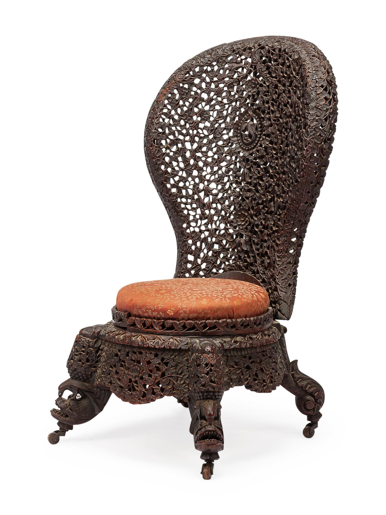 An Anglo-Indian Carved Slipper Chair