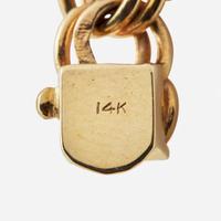 A 14K Yellow Gold Charm Bracelet with 14K Yellow Gold and Gemstone Charms